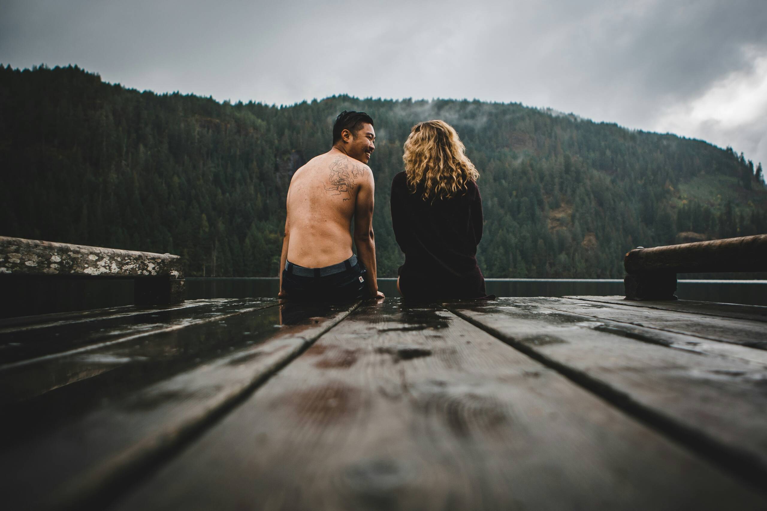 Couple sitting on dock healing relationship with what works